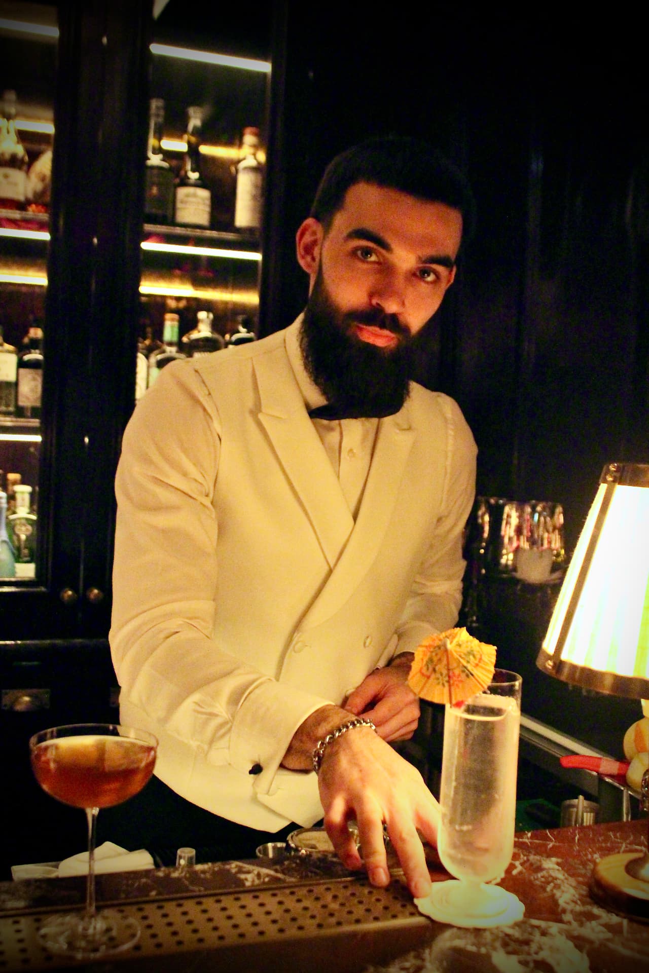 The Rockthehighball bartender behind a London bar